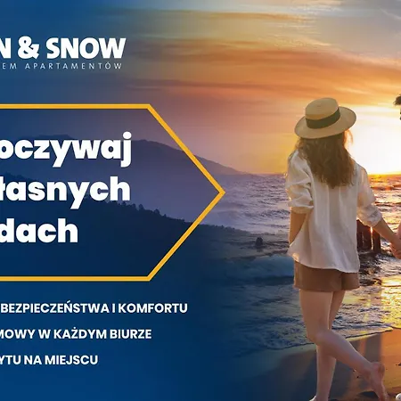 Sun & Snow Na Wydmie W Poblizu Plazy I Molo